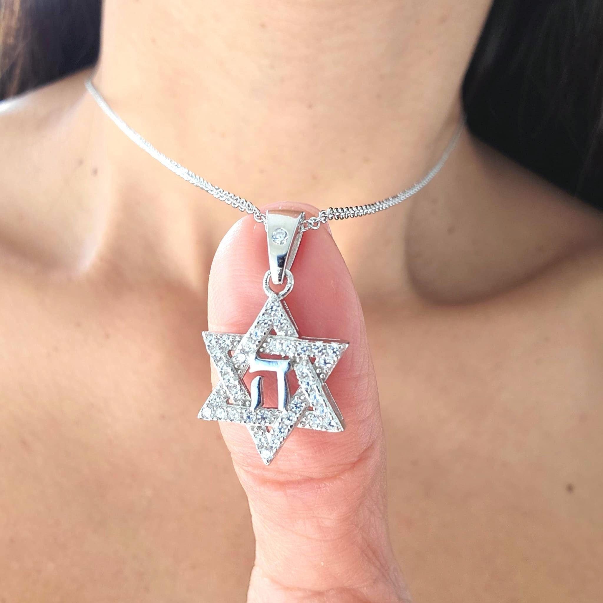 This YHWH Necklace is a powerful expression of faith, featuring the Hebrew Tetragrammaton יהוה  (Yahweh) in a sterling silver pendant. A significant piece of Judaica jewelry.